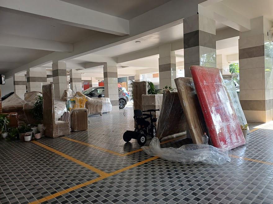 Sofa wrapped in stretch film for safe house shifting in Hyderabad