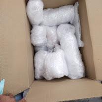 Professionally wrapped fragile household items ready for shifting in Hyderabad