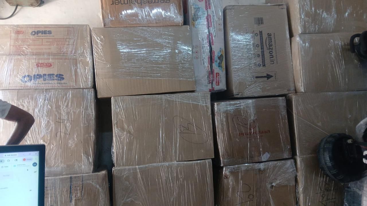 Stack of packed and labeled cartons ready for household shifting