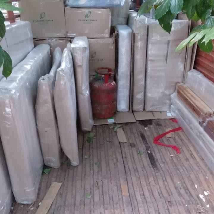 Packed cartons and household items ready for house shifting in Hyderabad