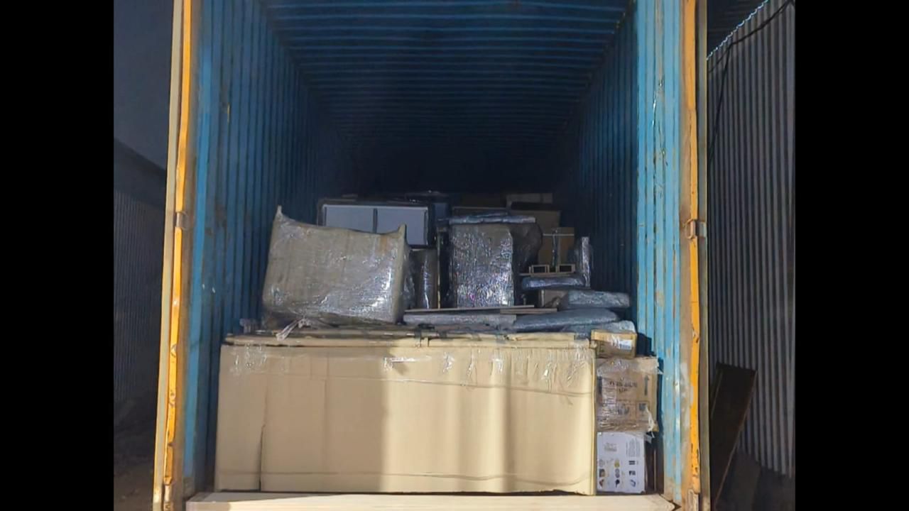 Container loaded with packed household goods for intercity shifting