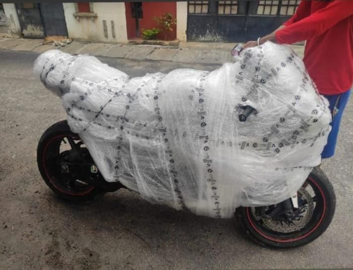 Sports bike fully wrapped in bubble wrap for safe bike transport
